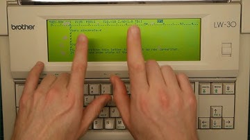 Hjalfi processes words on his new word processor