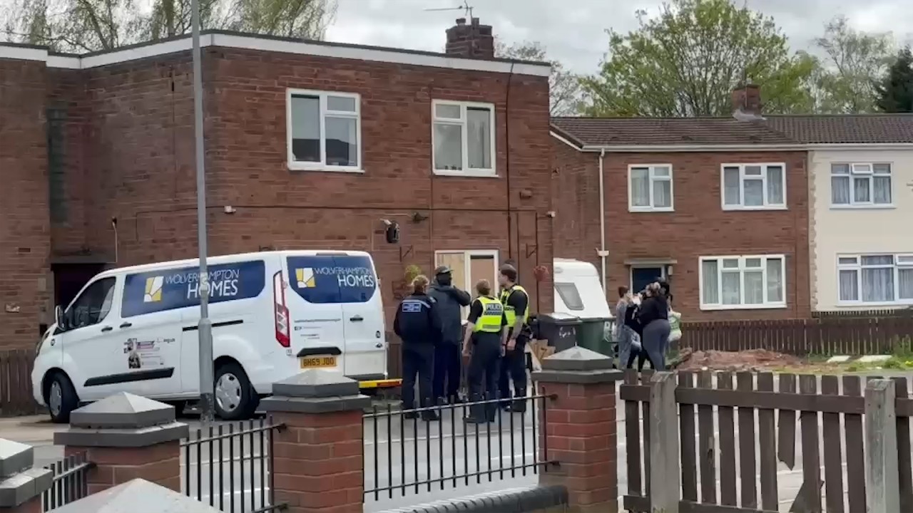 Woman, aged in her 70s, dies after being attacked by two dogs at house ...