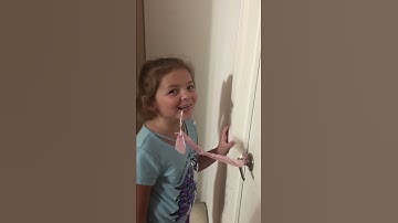 Loose tooth pulled by string
