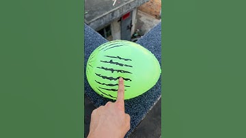 Experiment: Will a water balloon explode if it rolls down a tall building? 💥🎈 #balloon