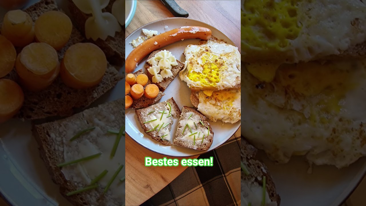 best essen! spiegeleier toast würstel brotemit butter und gänseblümchenstängel