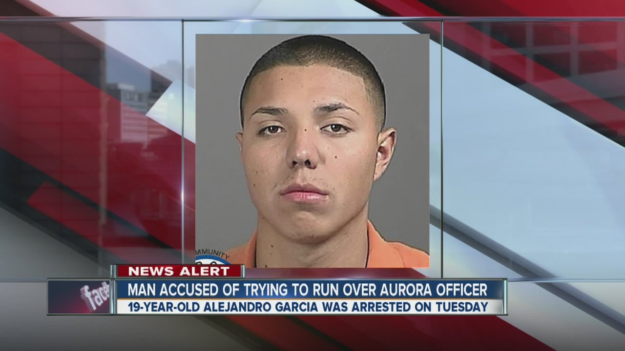 Man accused of trying to run over Aurora Police officer - YouTube