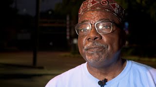 Activist Bilal Muhammad reacts to arrest in son's death