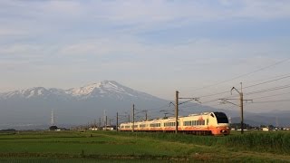 485系R編成とE653系特急いなほ 羽越本線 鳥海山と田植え後の水田