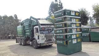 Waste Management Front Loader Collecting Stackable Dumpsters