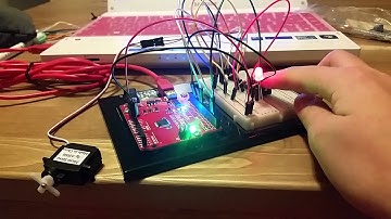 a micro servo controlled by two push buttons