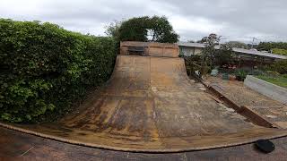 Roller skater does 540 on halfpipe and crashes into bushes