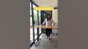 Elevating my workspace with my sleek new acacia wood desk! 😍 #standingdesk #wfh #desksetup