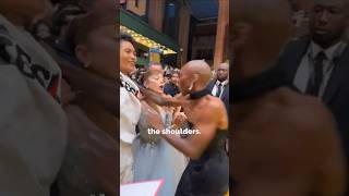 Fan Grabs Ariana Grande At Wicked Premiere