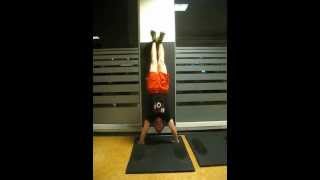 Wall Handstand - Step 3 of the Convict Conditioning Handstand Push Up Progression