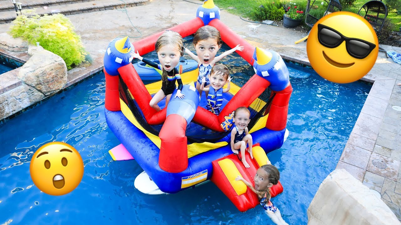 BOUNCE HOUSE IN THE POOL!!! Swimming in our Play Bouncy Box Fort and Swimming!!!