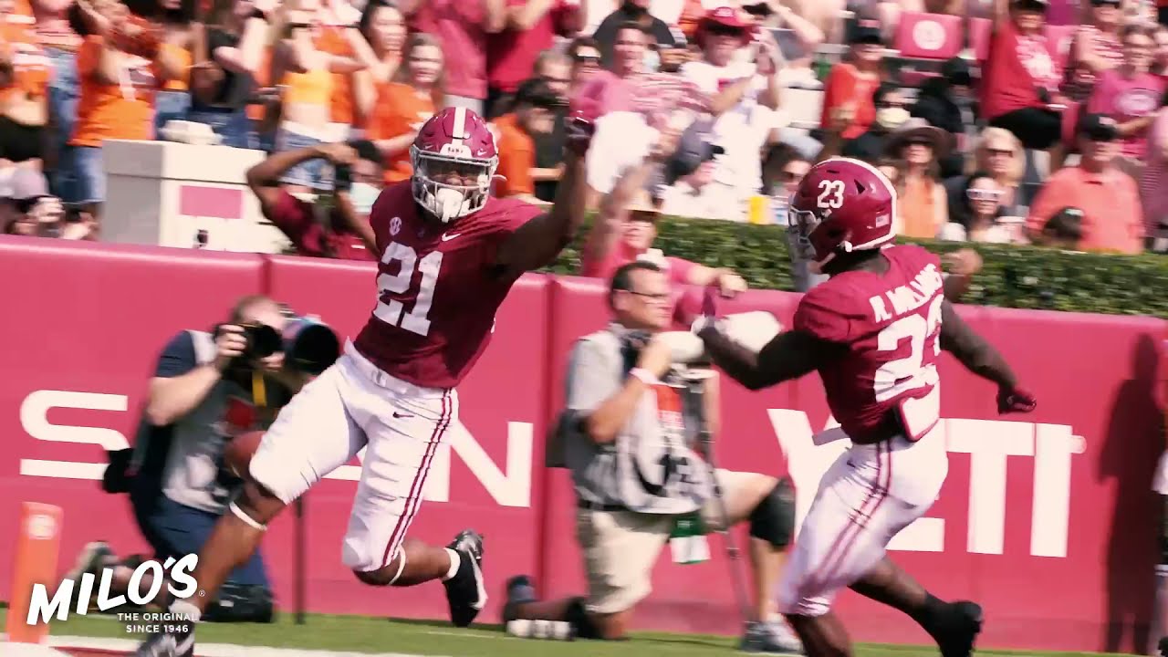 Alabama football's Chris Braswell blocks a punt for a scoop and score