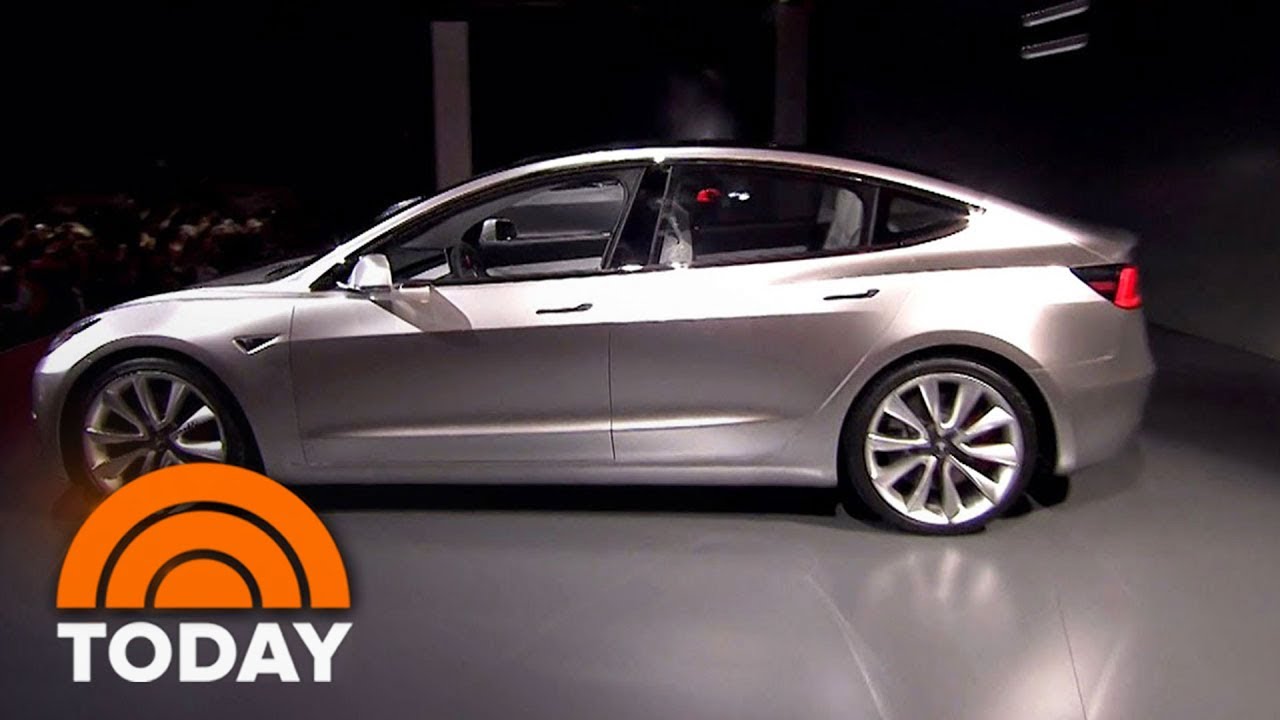 Tesla rolls out its first Model 3, and it's Elon's