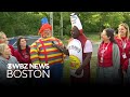 Massachusetts school principal who greets students in costume celebrated as he retires