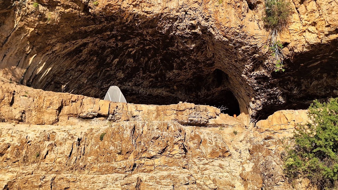 Discovery of a large ancient cave and a tent in it - YouTube