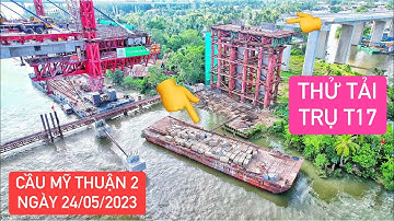 Tiến hành thử tải trên trụ T17 Cầu Mỹ Thuận 2, các khối bê tông khổng lồ đang được cẩu lên phía trên