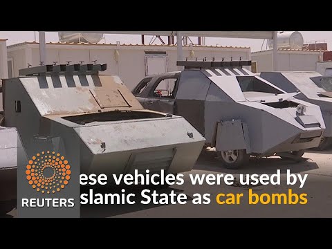 Iraqi police parade vehicles used by Islamic State as car bombs - Iraqi police parade vehicles used by Islamic State as car bombs