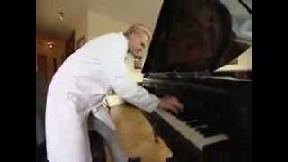 MUSICIAN DOCTOR &quot;DR O&quot;: Dr. Allan Austin Oolo plays Jerry Lee Lewis, Whole Lotta Shakin