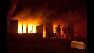 Dramatic Video of Fire Rescue Three children rescued from a burning building by police firefighters