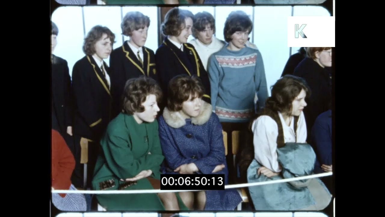 1960s UK, School Girls in Audience, Sports Hall, 16mm