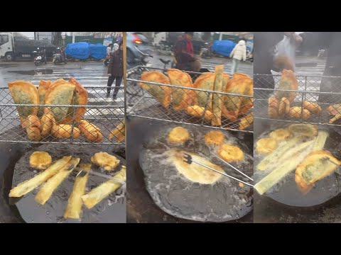 Cooking deep fried foods on the street.
