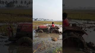 Miniature Kubota Tractor stuck in mud rescue with Mahindra Tractor