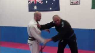 Karate instructor smacks student in the face and fight break out