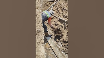Workers take out sand do casting lean concrete