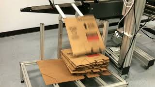 Vertical Case Transport with Labeling System and HSAJet MiniKey Printer