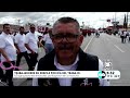 Trabajadores en desfile por día del trabajo