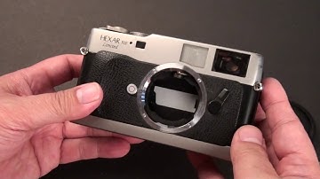 Konica Hexar Titanium RF Millennium limited edition, only 2001 units made. Leica M mount |Steve flip