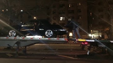 Loading & Unloading a Car on a Flatbed Semi Trailer Without Ramps