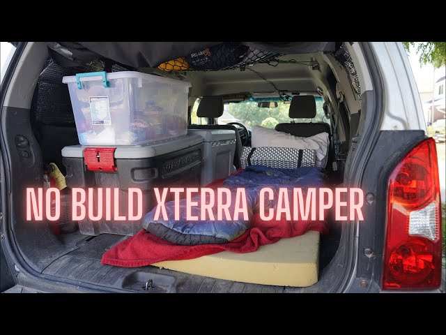 My car camping setup in my Nissan Xterra : r/carcamping