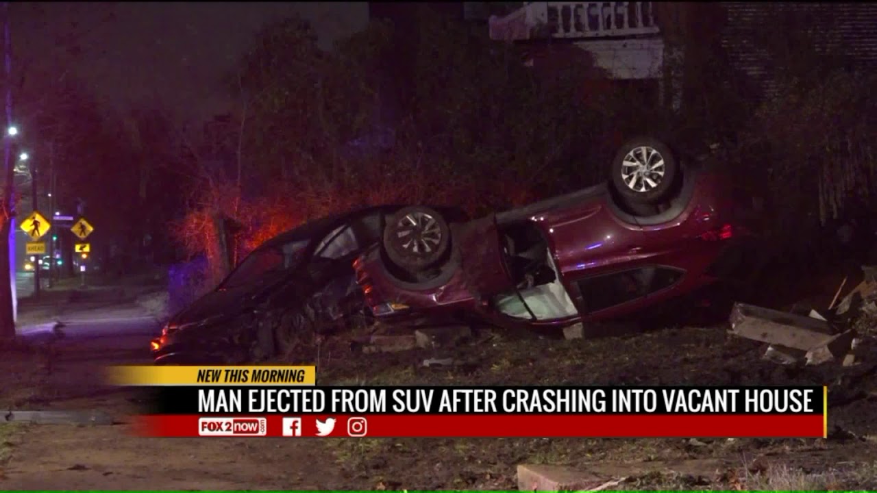 Man ejected from SUV after crashing into vacant home - YouTube