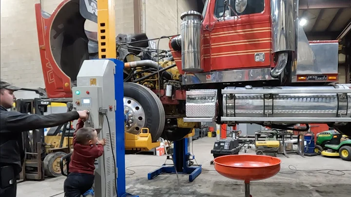Dropping the oil pan on our Western Star 4964F to ...
