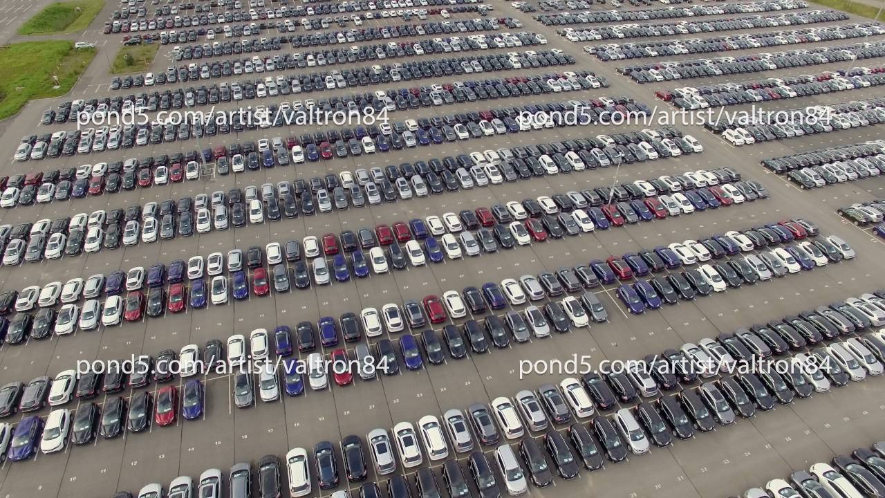 Flying Above Storage Parking Lot Of New Unsold Cars Aerial View Flying Above Storage Parking Lot Of New Unsold Cars Aerial View