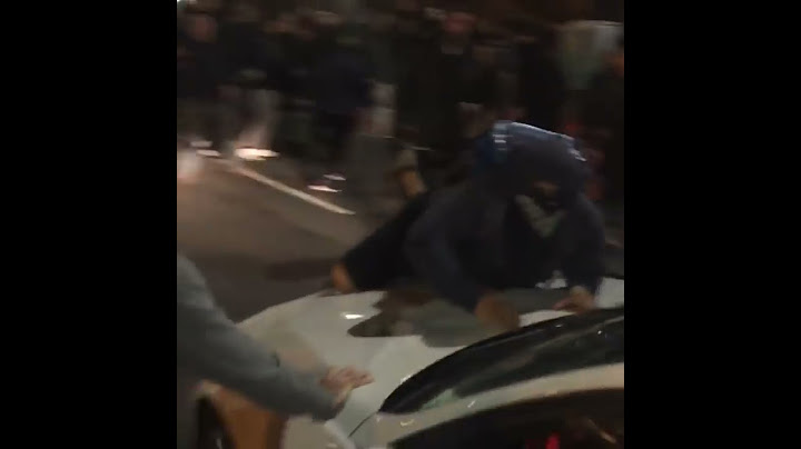 Protester hit by car