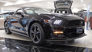 715-852-1000. this shadow black, rear-wheel drive, 2 door convertible
comes with the california special package, a 6-speed manual
transmission, and 5.0 lit...