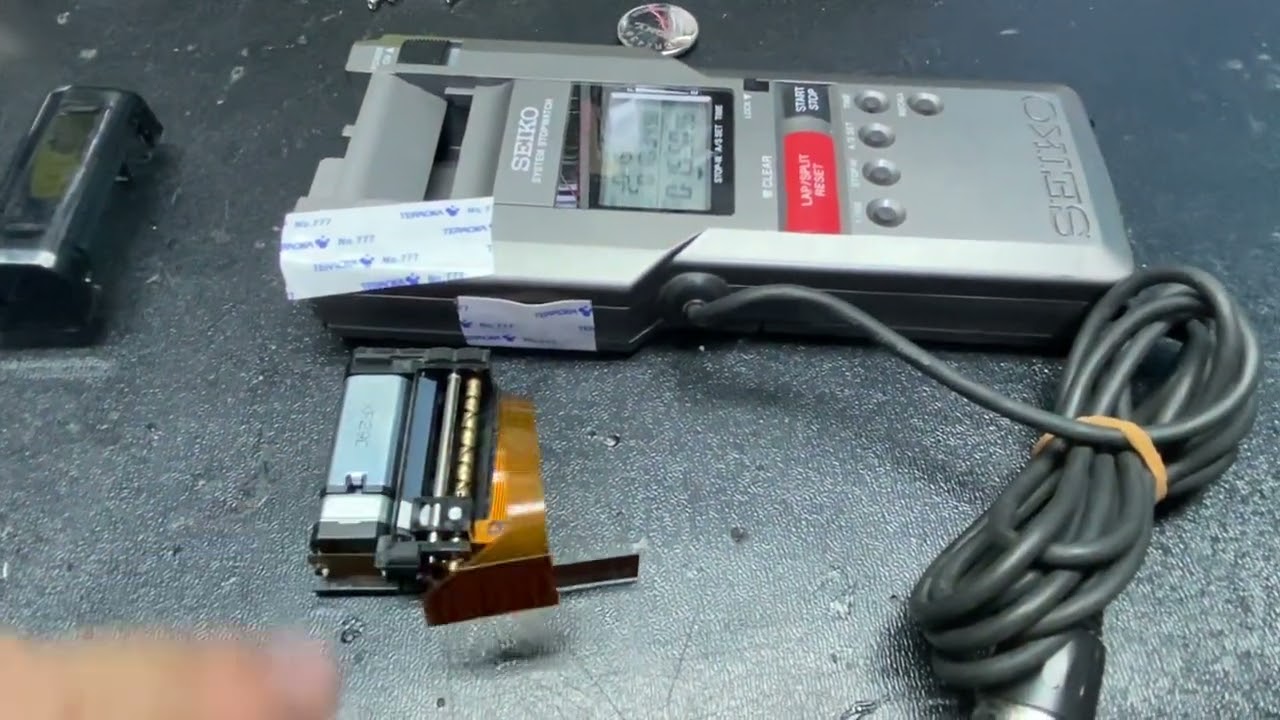 セイコーシステムストップウォッチの紙送りが出来ない件 - YouTube