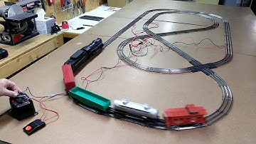 Refurbished postwar Lionel complete steam freight train set with 7x3 double-crossover track layout