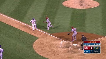 STL@CHC: Martinez fields bunt, tags Coghlan out