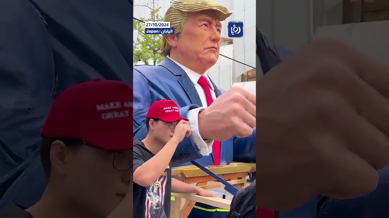 Giant talking Trump robot seen in Japan march - YouTube