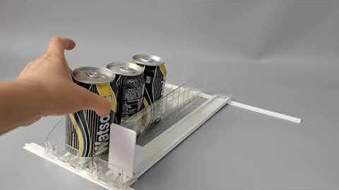 Slow motion shelf pusher system