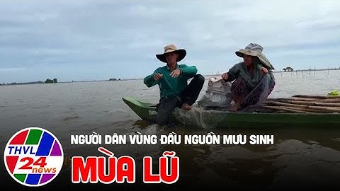 Người dân vùng đầu nguồn mưu sinh trong mùa lũ