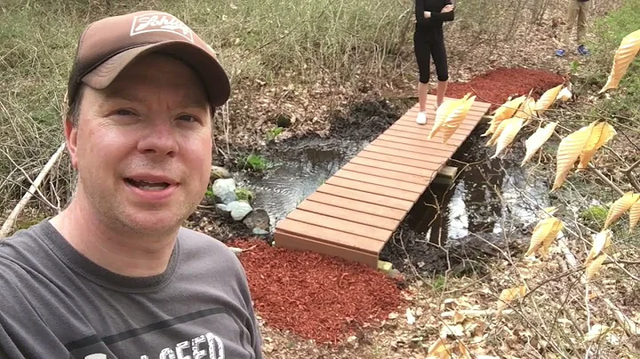 Building a simple hiking trail bridge in the woods...