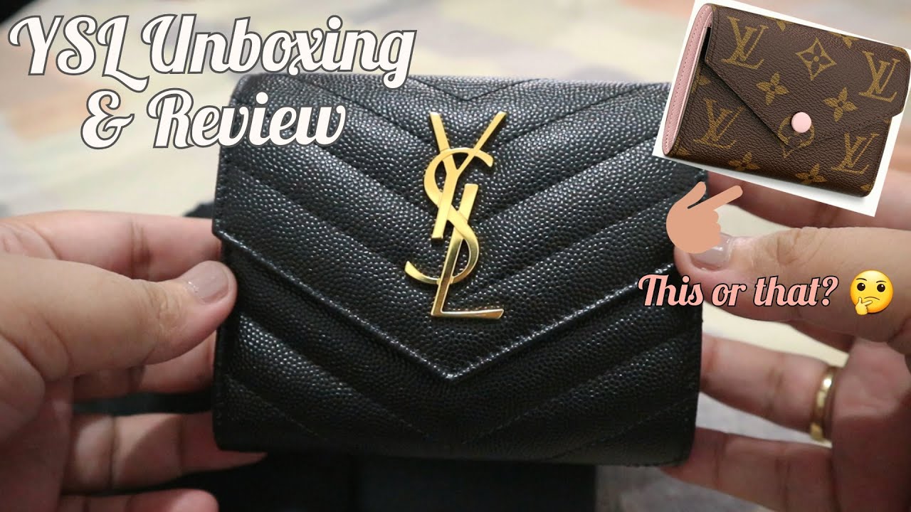 YSL ZIPPED BI-FOLD WALLET IN GRAIN DE POUDRE EMBOSSED LEATHER