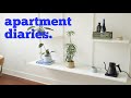 living room updates, painting, open shelving | Apartment Diaries