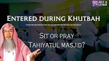 If one enters masjid while Imam is giving Khutbah, should he  sit & listen or pray Tahiyatul Masjid?