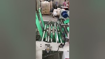 Automatic star sealing garbage bag-on-roll making machine coreless