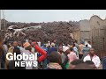 Goma area residents in Democratic Republic of the Congo return to sort through volcano-damaged homes